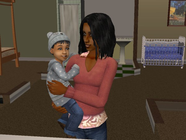 Latoya holds her daughter, Aisah